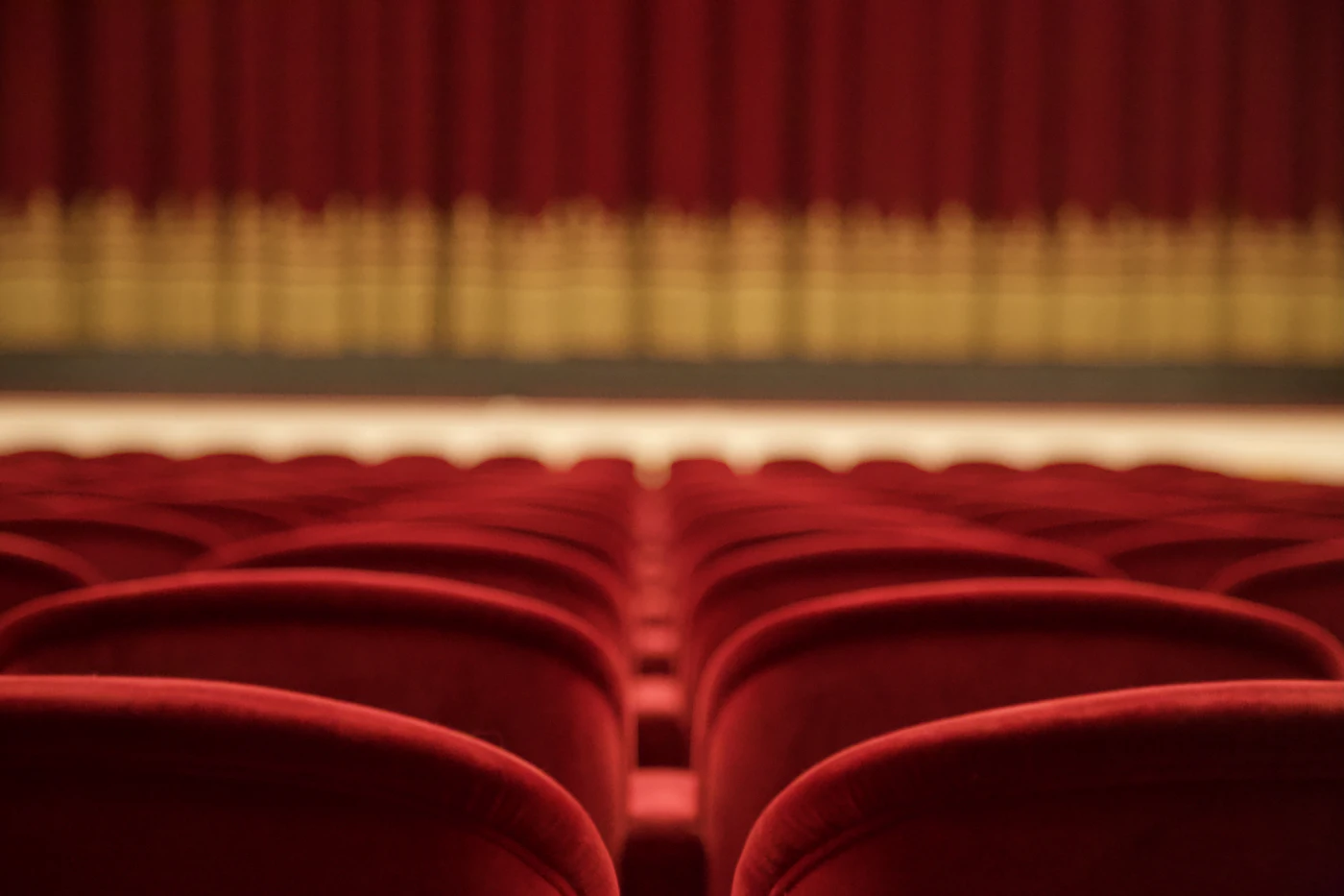 Rows of red theatre seats