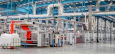 industrial textile factory with machinery and pipes