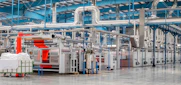 industrial textile factory with machinery and pipes
