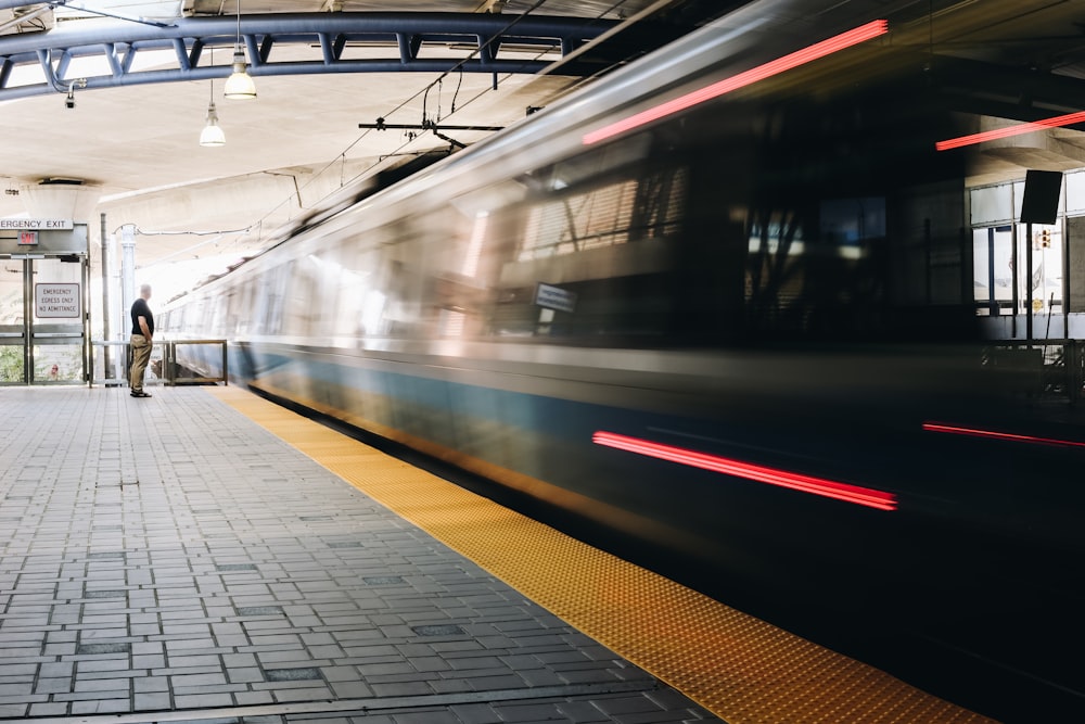 time lapse photo of a train station