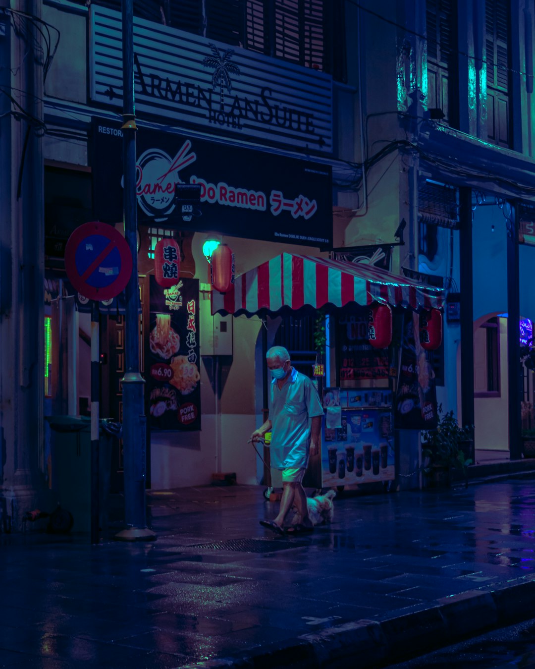 woman in white and red dress walking on street during nighttime