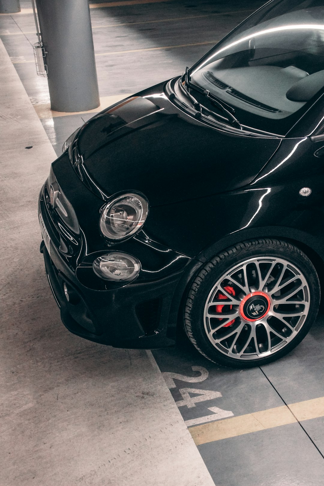 black car on gray concrete floor