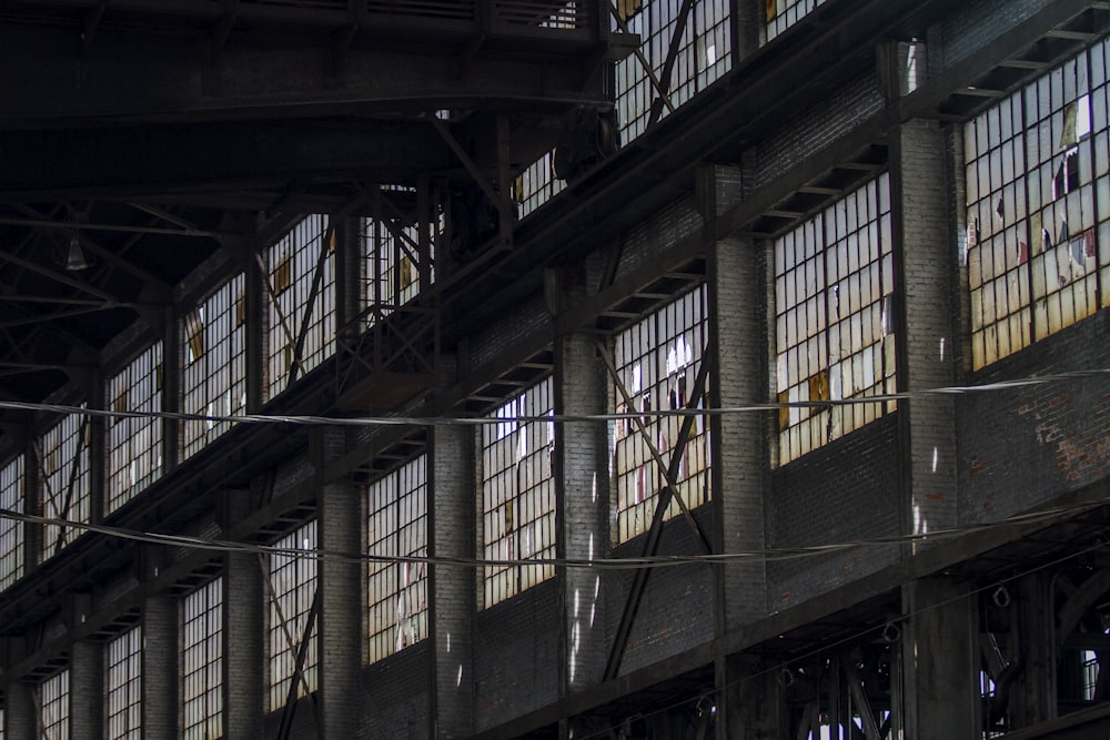 the inside of a large building with lots of windows