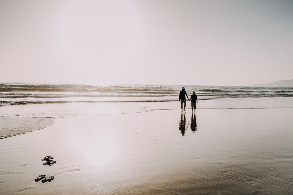 person walking on the beach