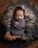 A peacefully sleeping baby wrapped in a soft, gray fabric, nestled in a cozy arrangement of textured, woolen materials. The baby has closed eyes and slightly tousled hair, with hands gently clasped. The setting includes soft layers of gray and beige hues, providing a warm and snug environment.