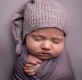 child in gray knit cap