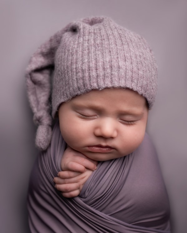 Sleeping newborn baby in neutral tones