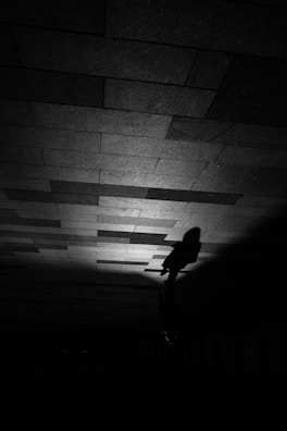 A dramatic portrayal of Michael being pursued by shadowy figures.