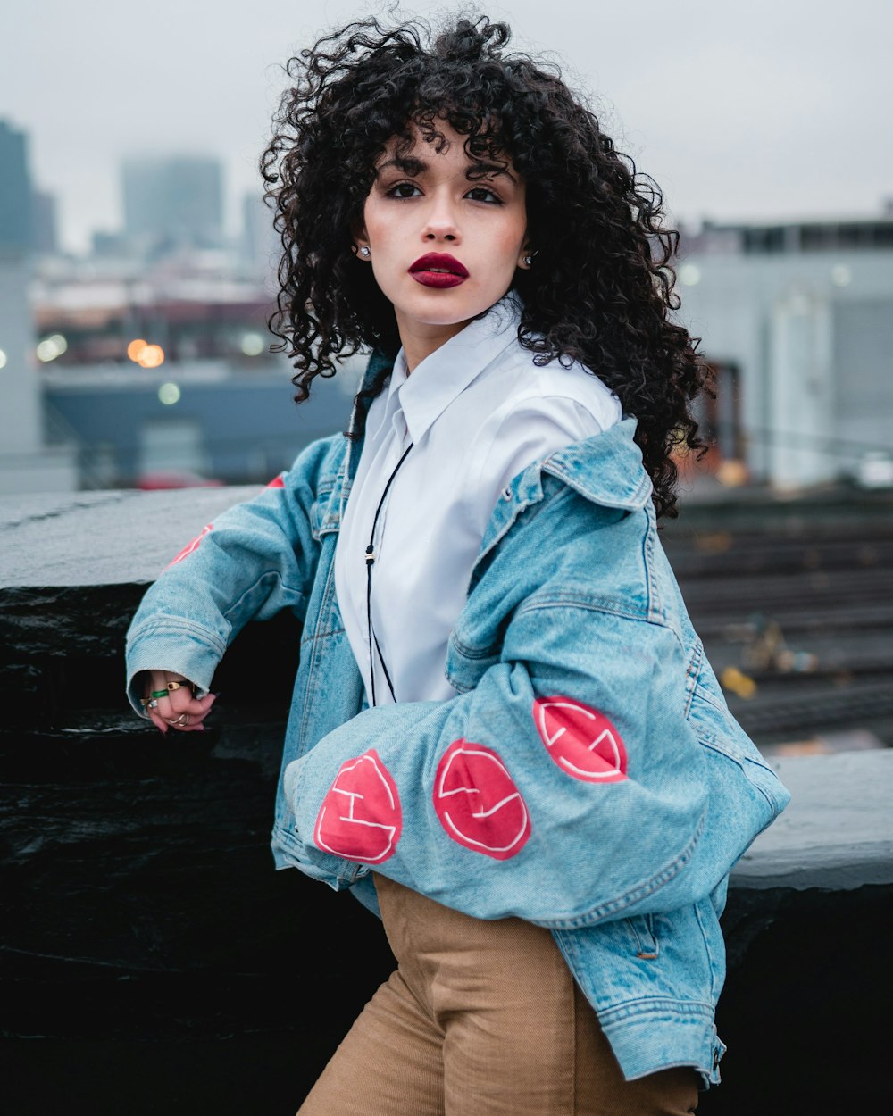 woman in blue denim jacket and blue denim shorts