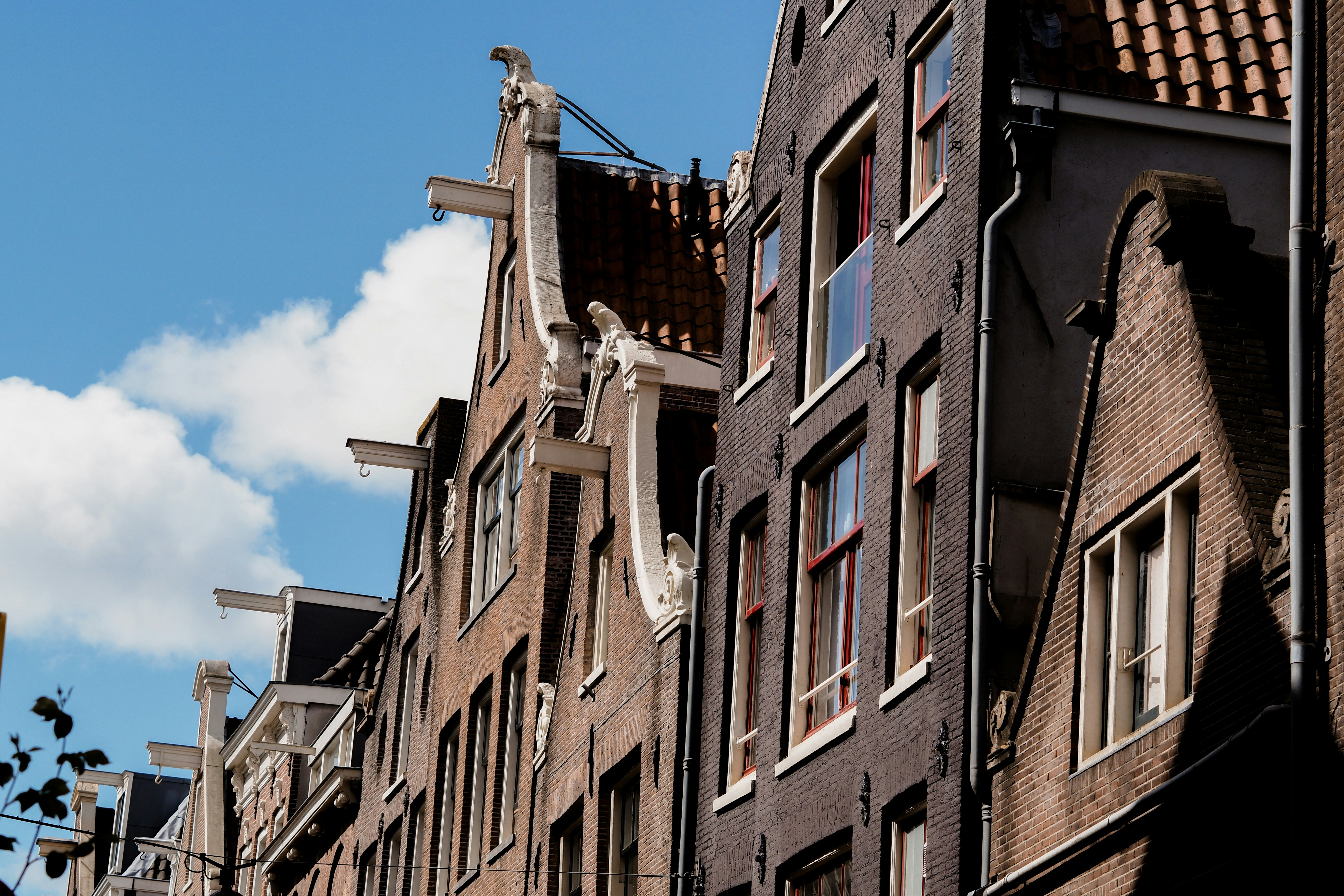 brown concrete building under blue sky during daytime