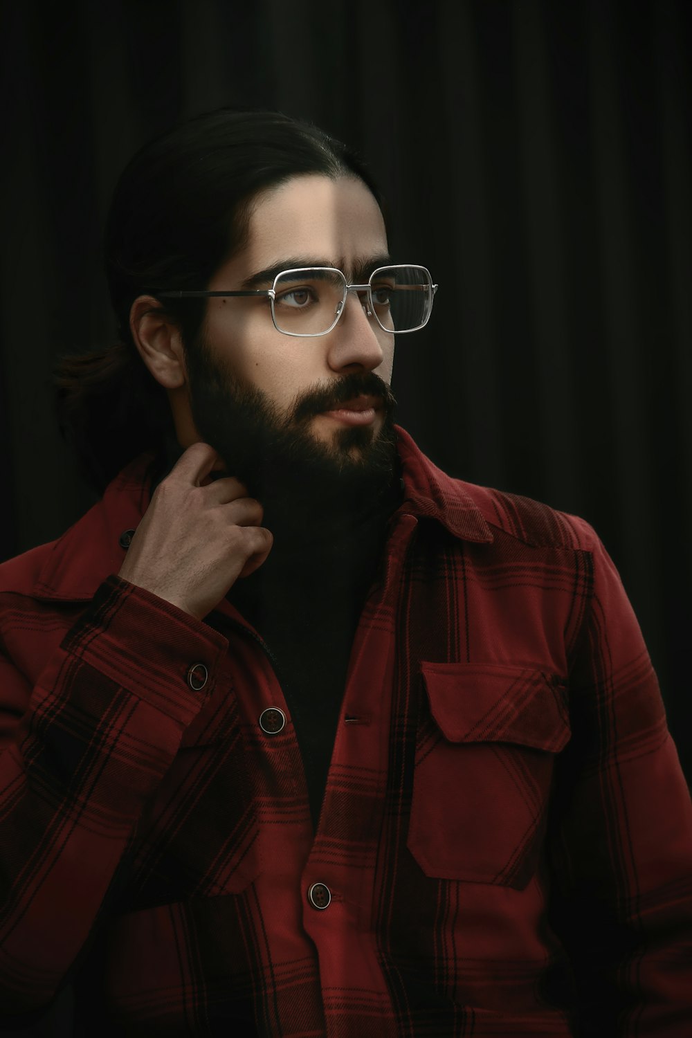 A man with glasses and a red and black shirt photo – Man Image on