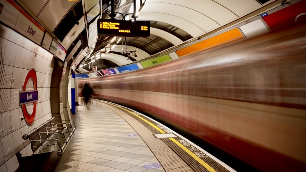 white and brown train in train station