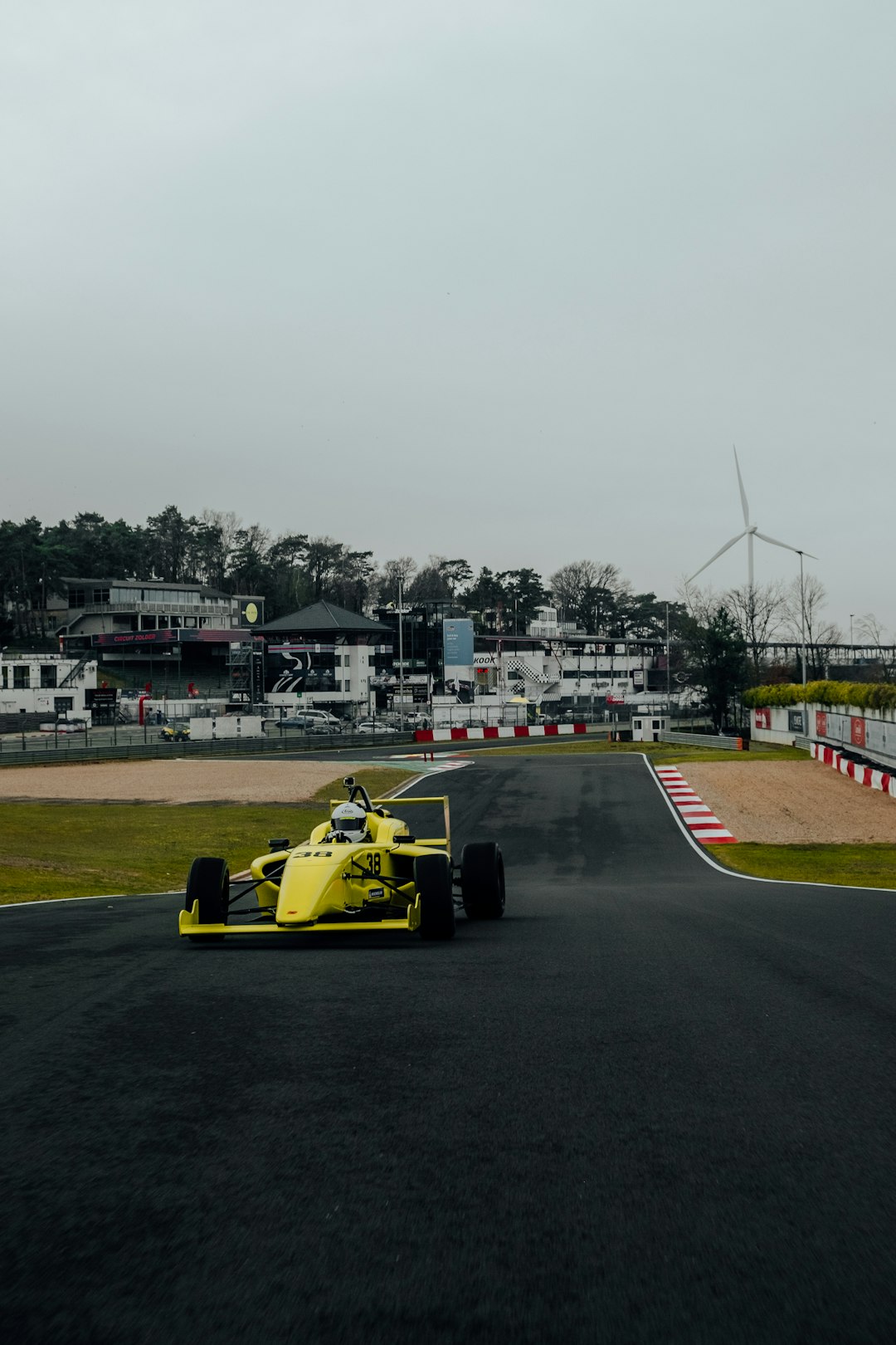 yellow and black f 1 on road during daytime