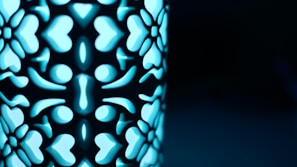 Close-up of a unique gift item featuring intricate details and a light blue palette.