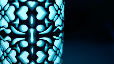 A close-up shot of a rose gold decorative wall piece reflecting soft light, highlighting intricate patterns.