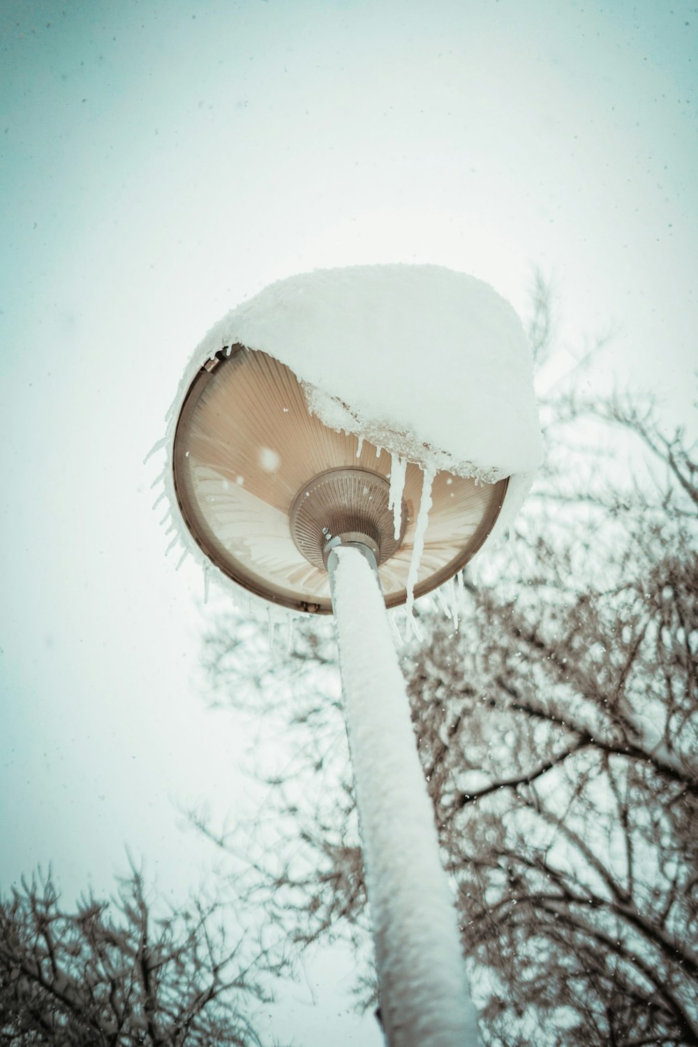 white and brown outdoor lamp