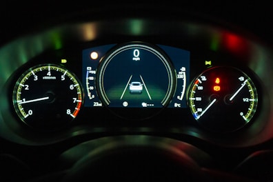 black and white car instrument panel cluster