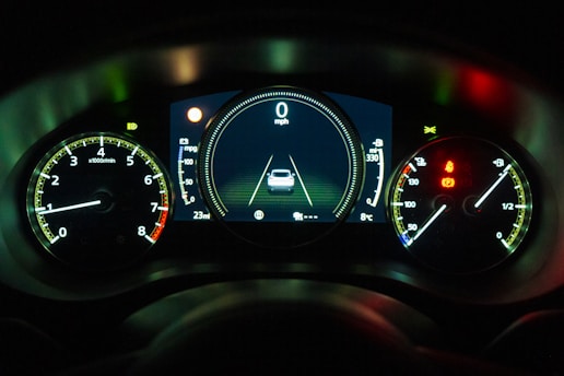black and white car instrument panel cluster