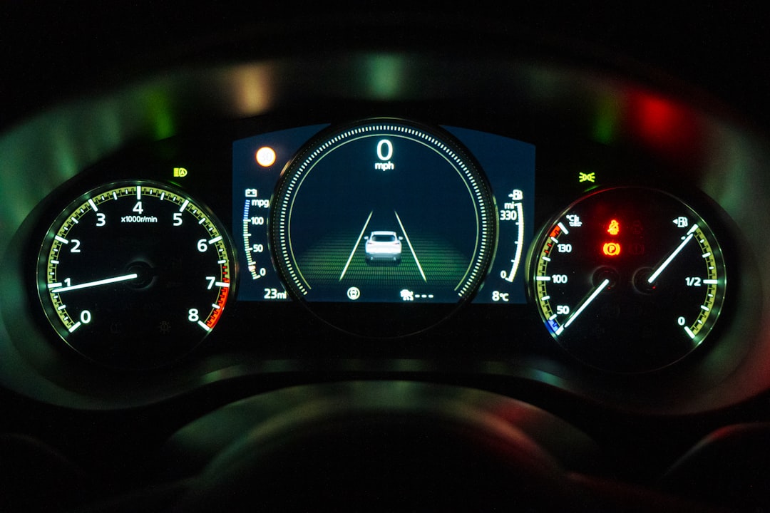 black and white car instrument panel cluster, An illuminated car dashboard.