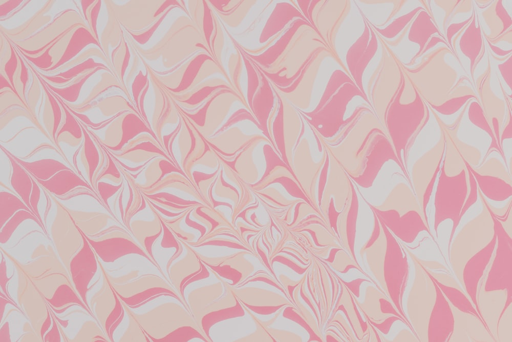 pink and white floral textile