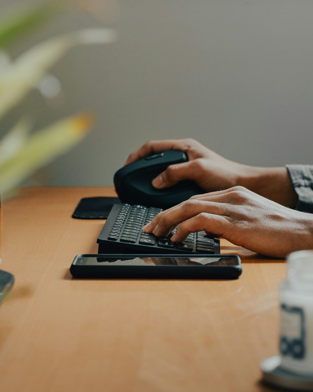 person using black laptop computer