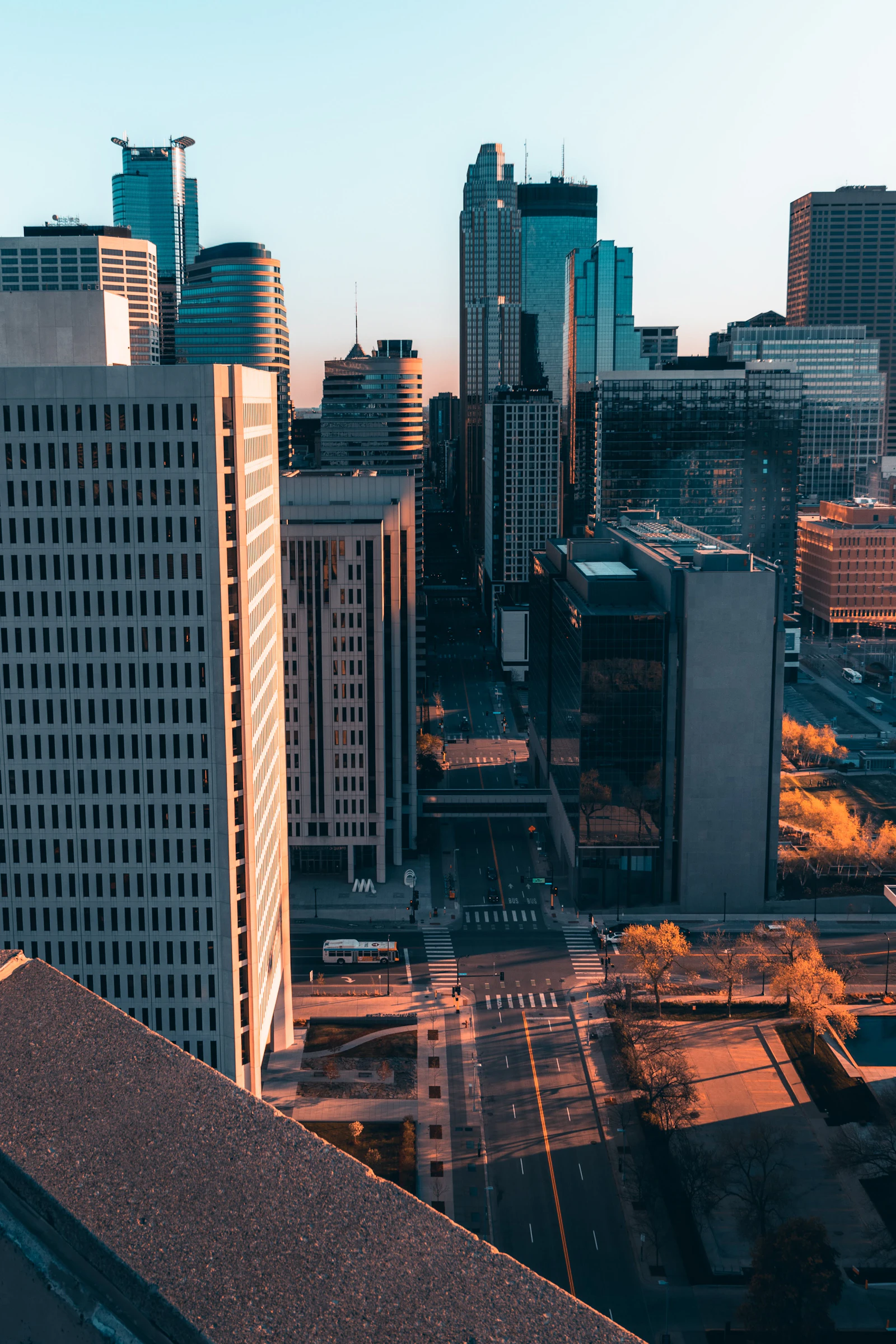 Downtown Dallas office towers with low-slope roofs and rooftop mechanical equipment
