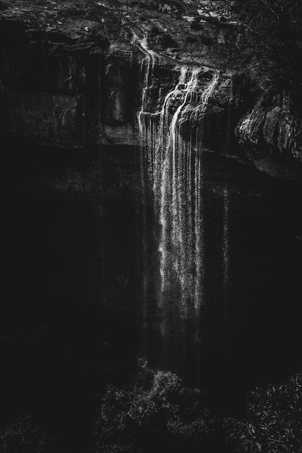 grayscale photo of water splash