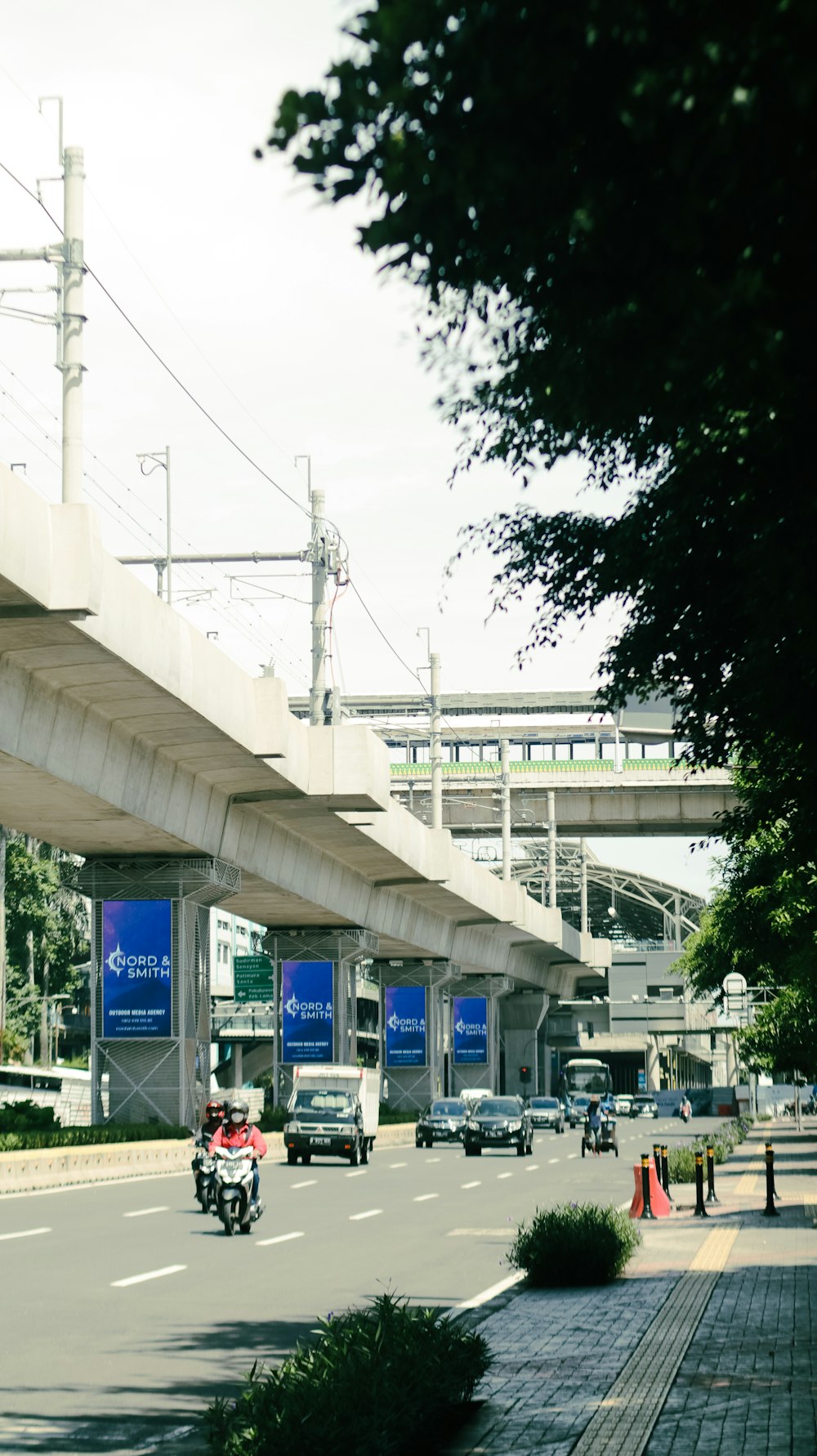 white and blue bus on the road during daytime