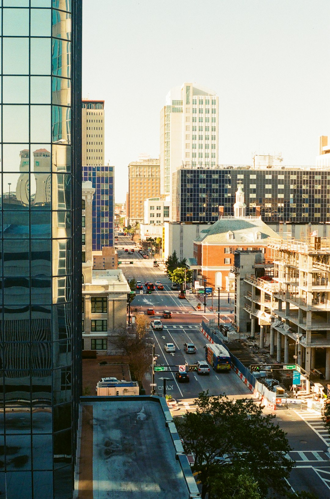 cars on road near buildings during daytime