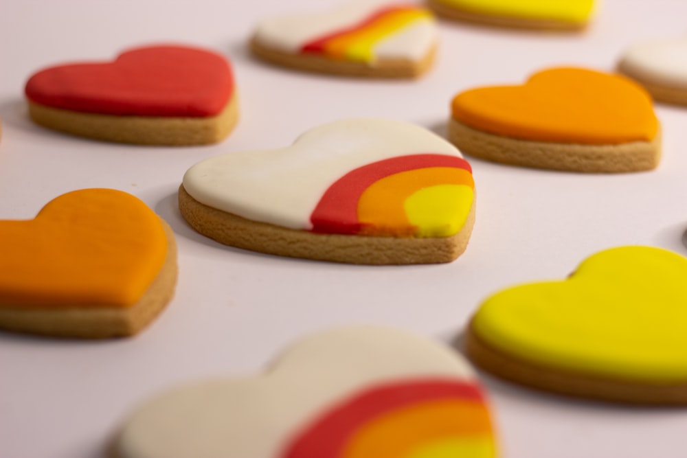 white yellow pink and orange heart shaped cookies