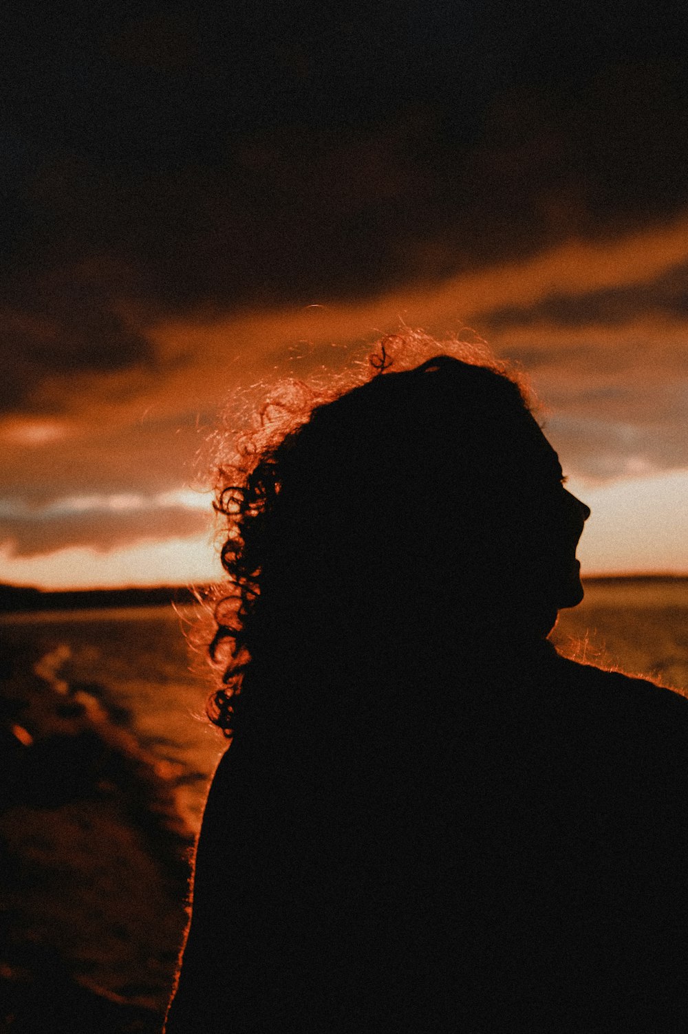 silhouette of person during sunset