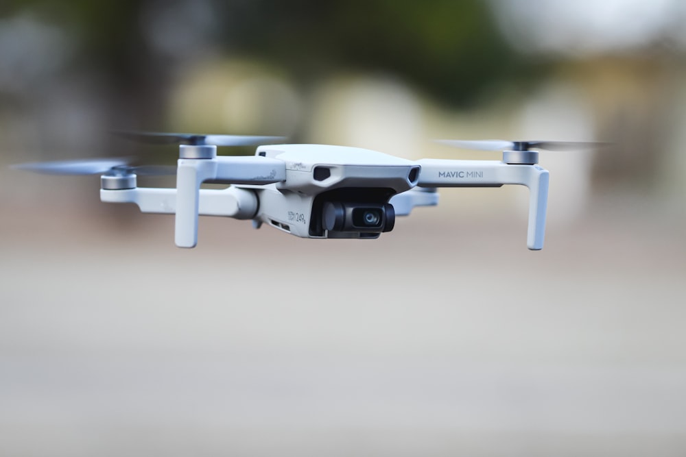 white and black drone in close up photography