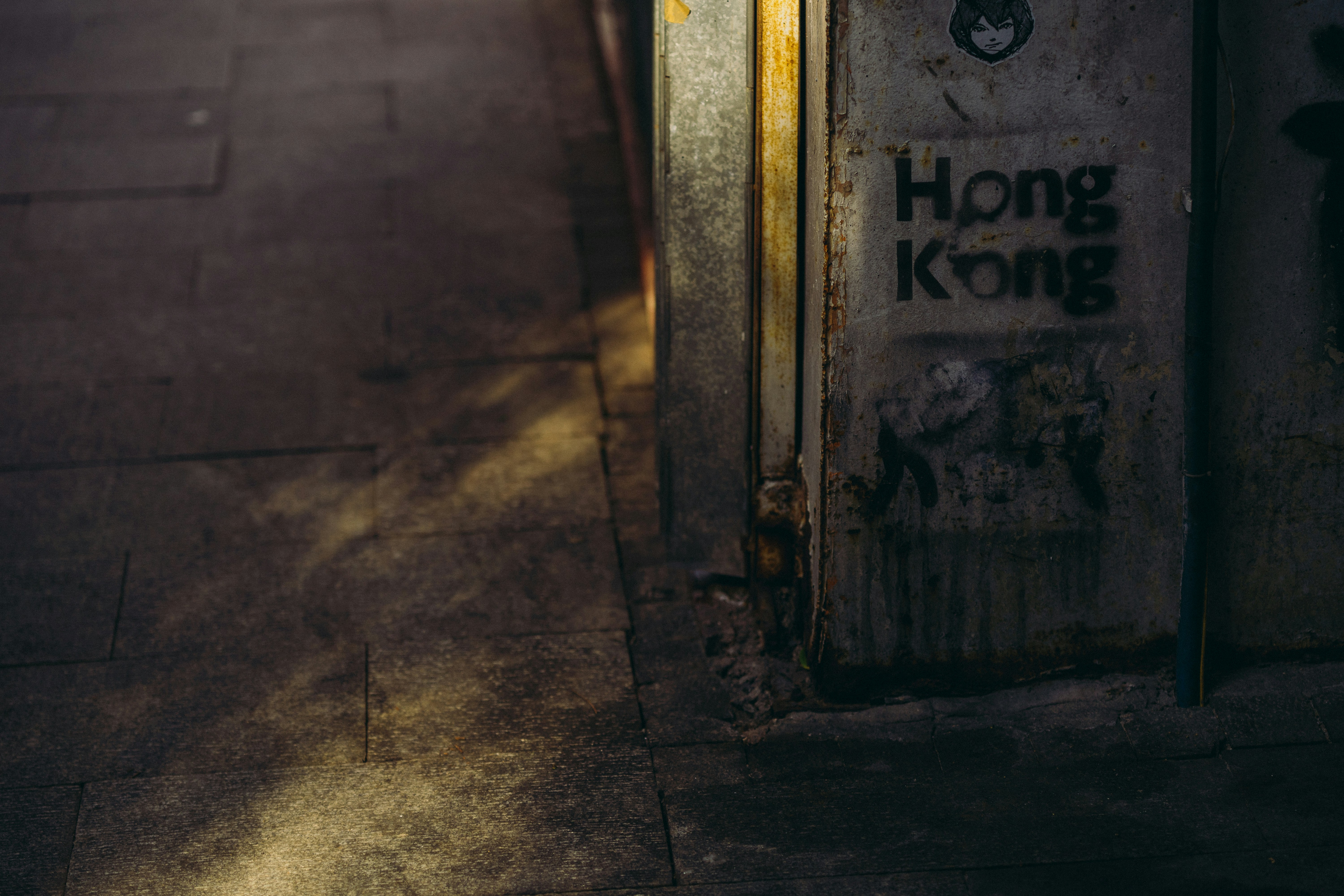 brown wooden door with black metal door lever