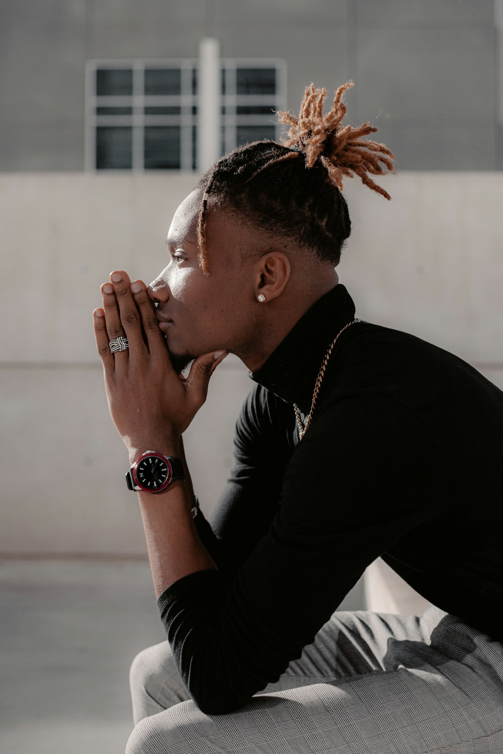 Black Male Portrait featuring a MVMT watch 