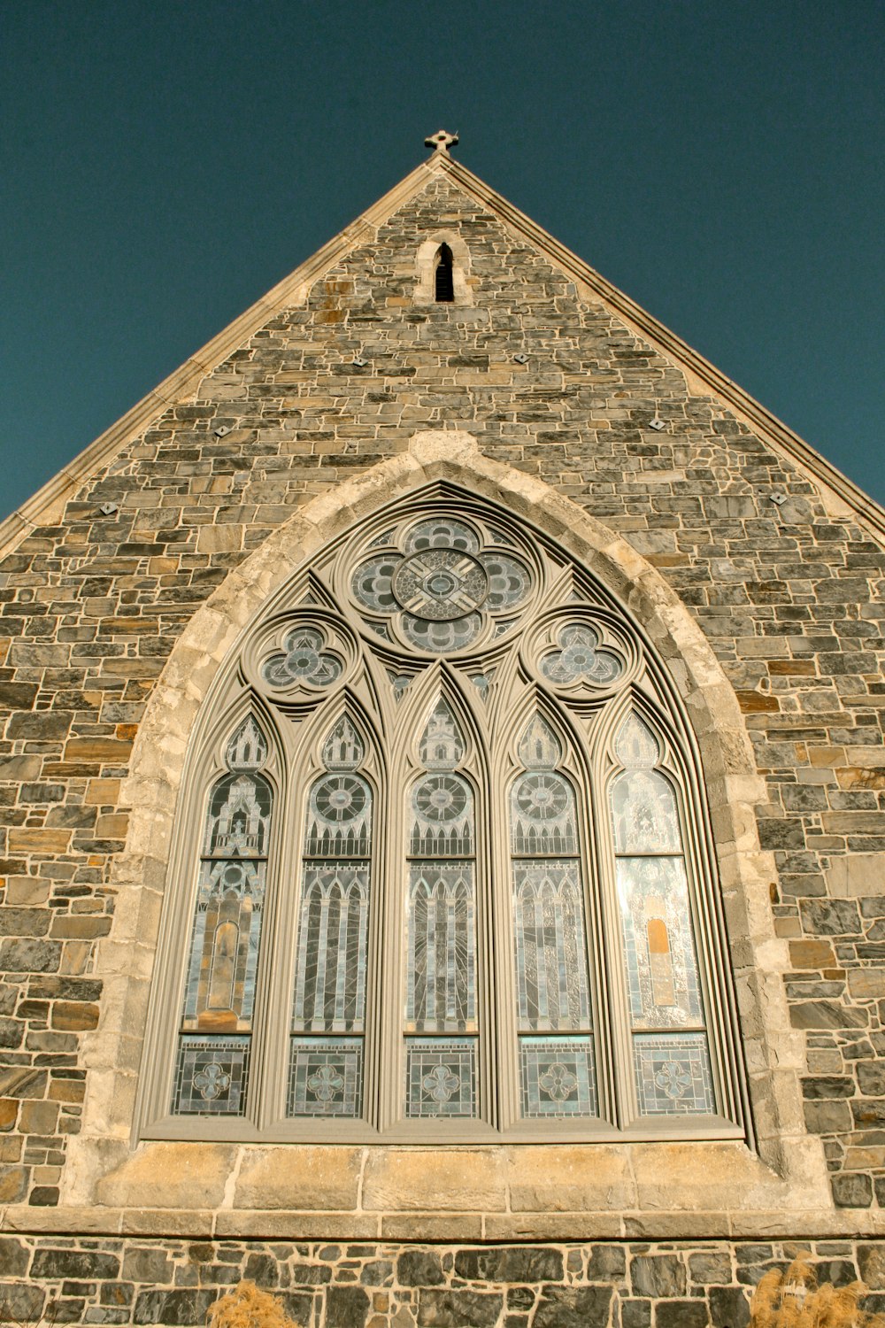 brown brick building under blue sky during daytime