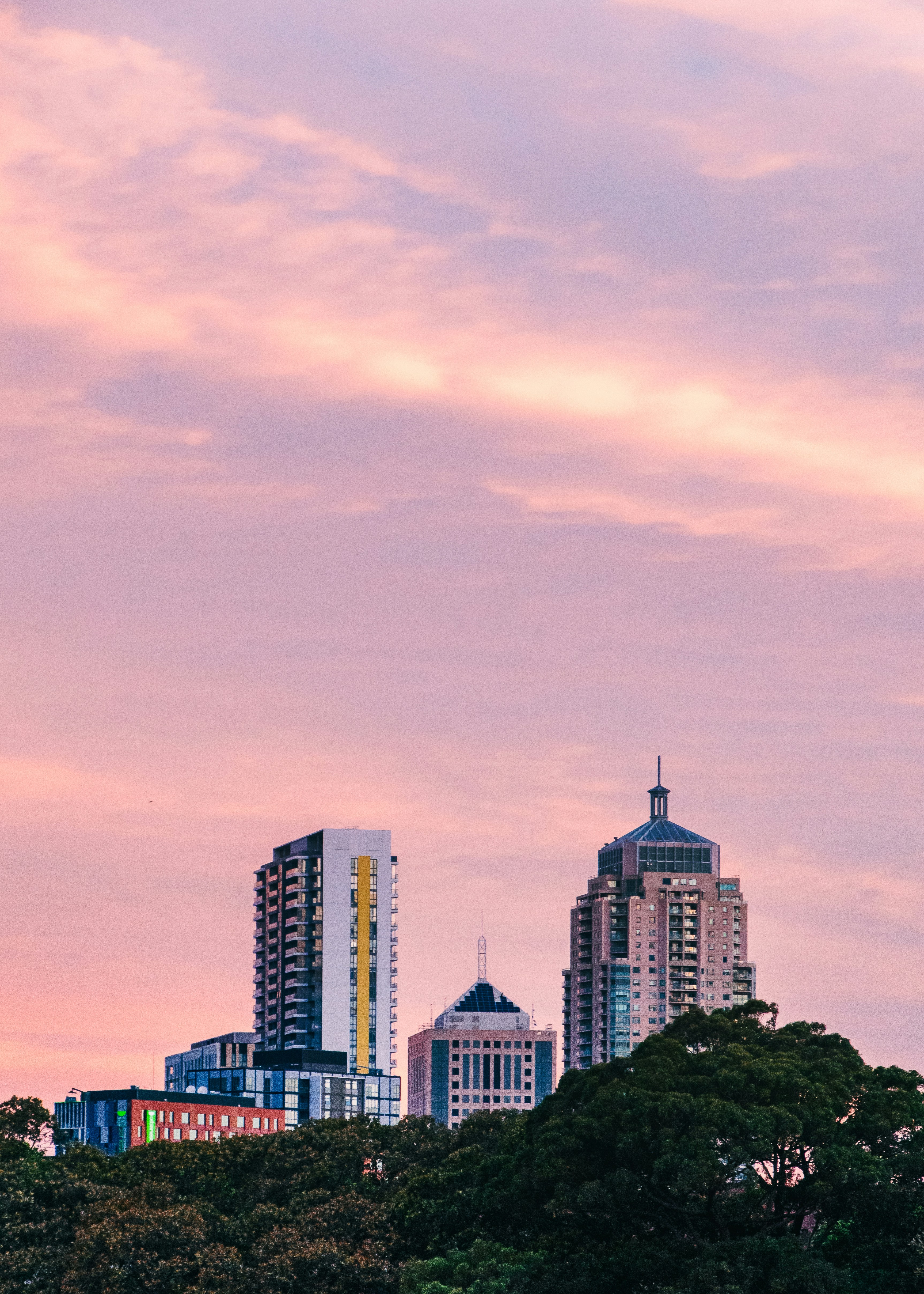 city skyline under blue sky during daytime