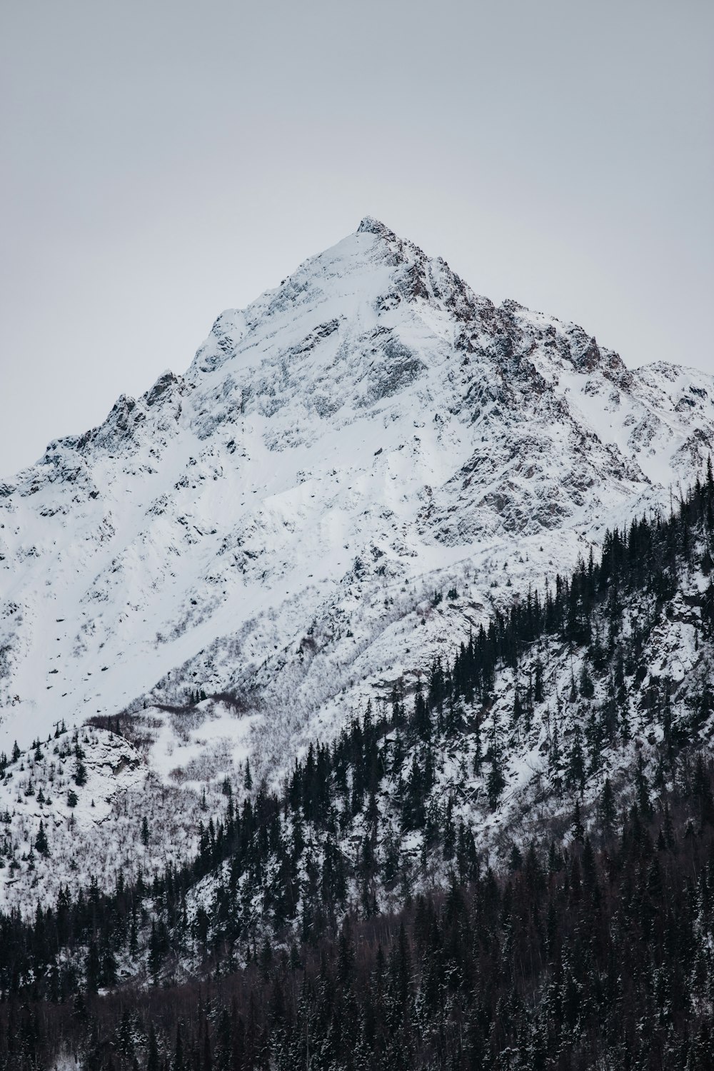 snow covered mountain during daytime