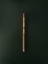 Detailed showcase of pencil packaging displaying company info and branding.