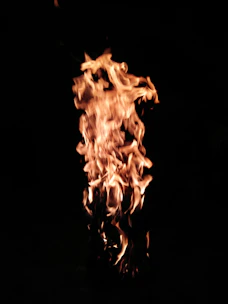 Dynamic flames engulfing a digital graph showing rapid upward growth.