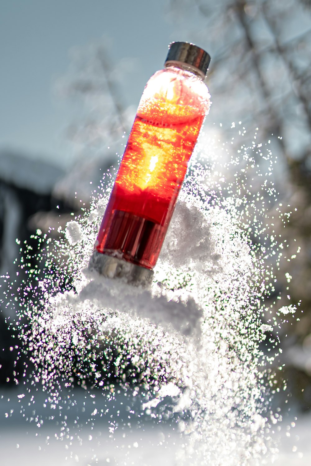 water droplets on orange plastic bottle