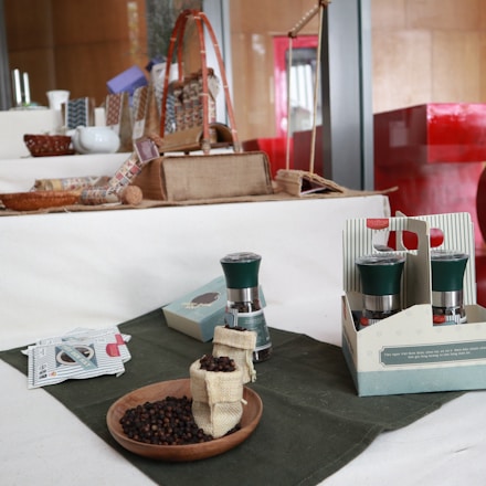 A diverse array of commodities displayed on a wooden table.