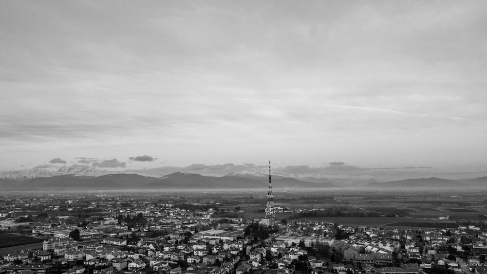 grayscale photo of city buildings