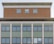 Facade of a multi-storey building with a symmetrical arrangement. The upper section features a brick texture and three evenly-spaced windows. Below, a larger section displays green tiling and numerous windows framed with wood.