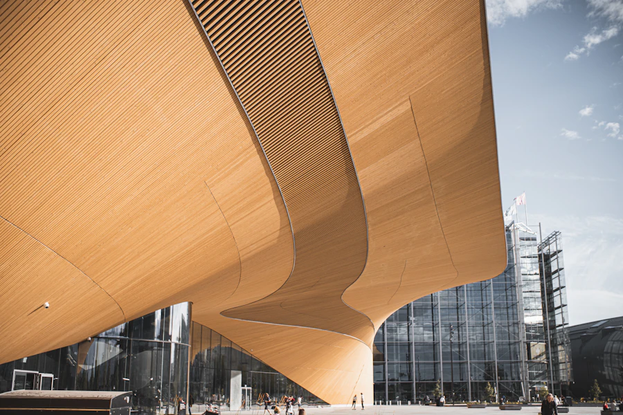 Curved wooden exterior of Oodi Central Library in Helsinki