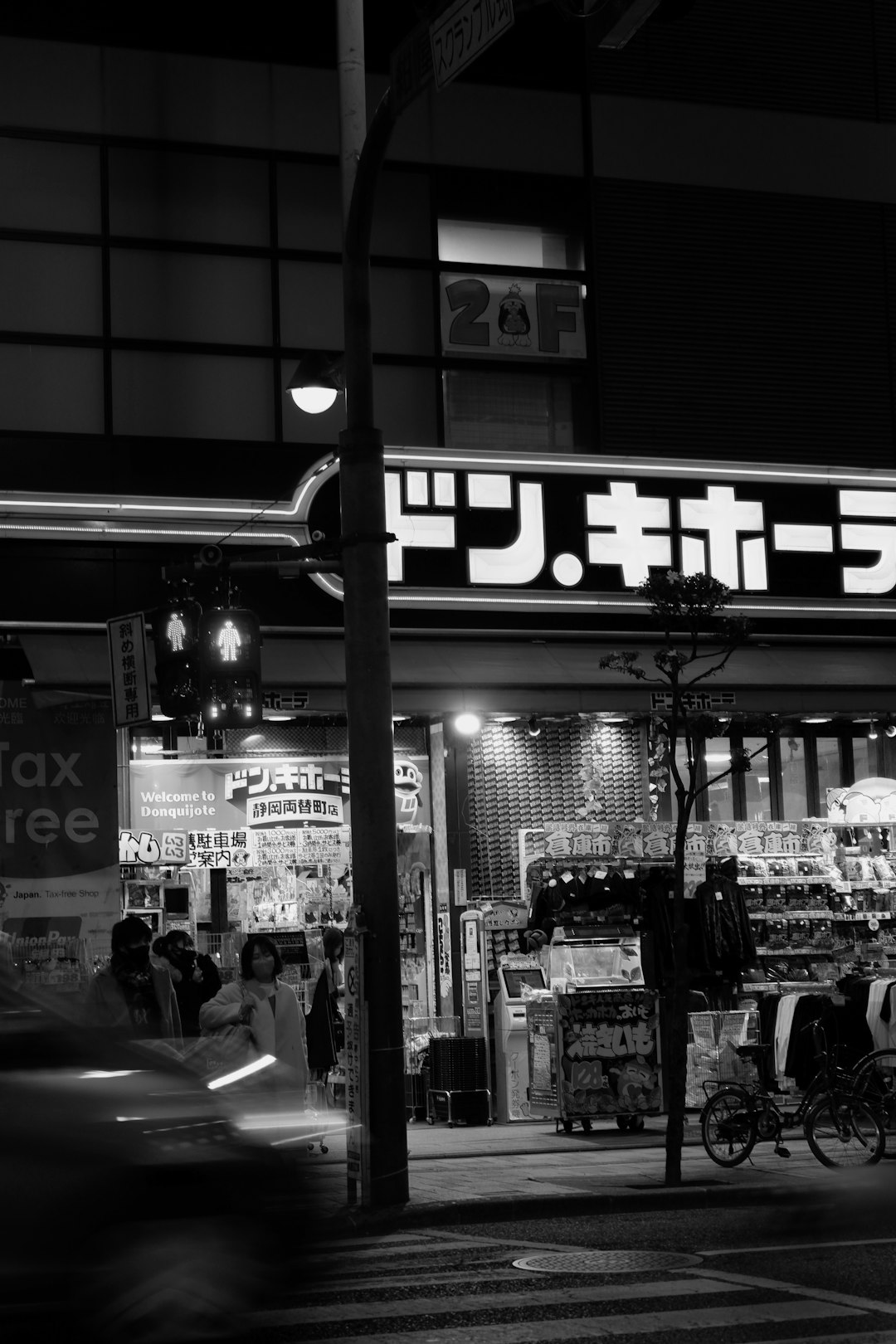 grayscale photo of people walking on street