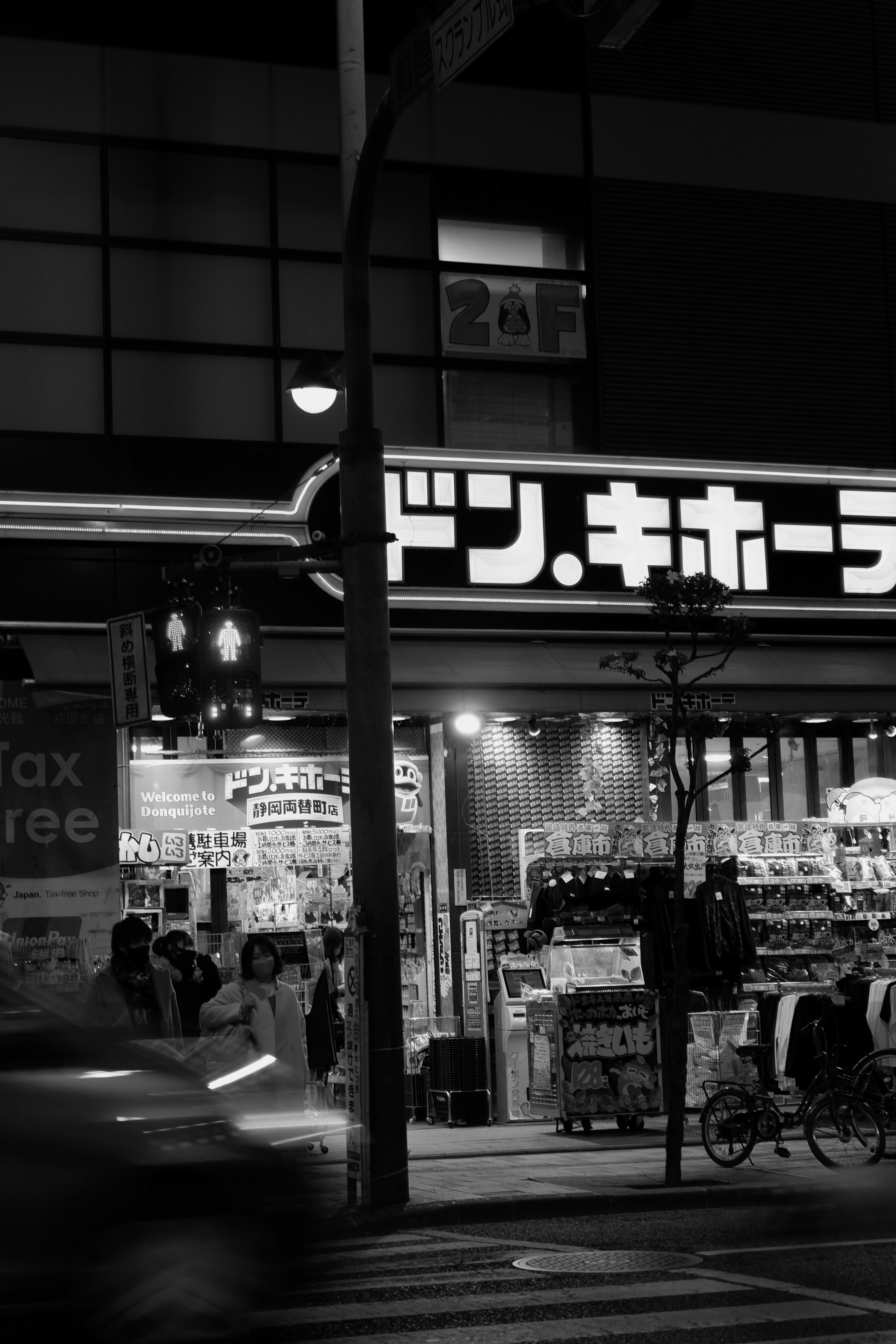 grayscale photo of people walking on street