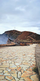 A rugged mountain trail symbolizing the challenging journey of personal formation.