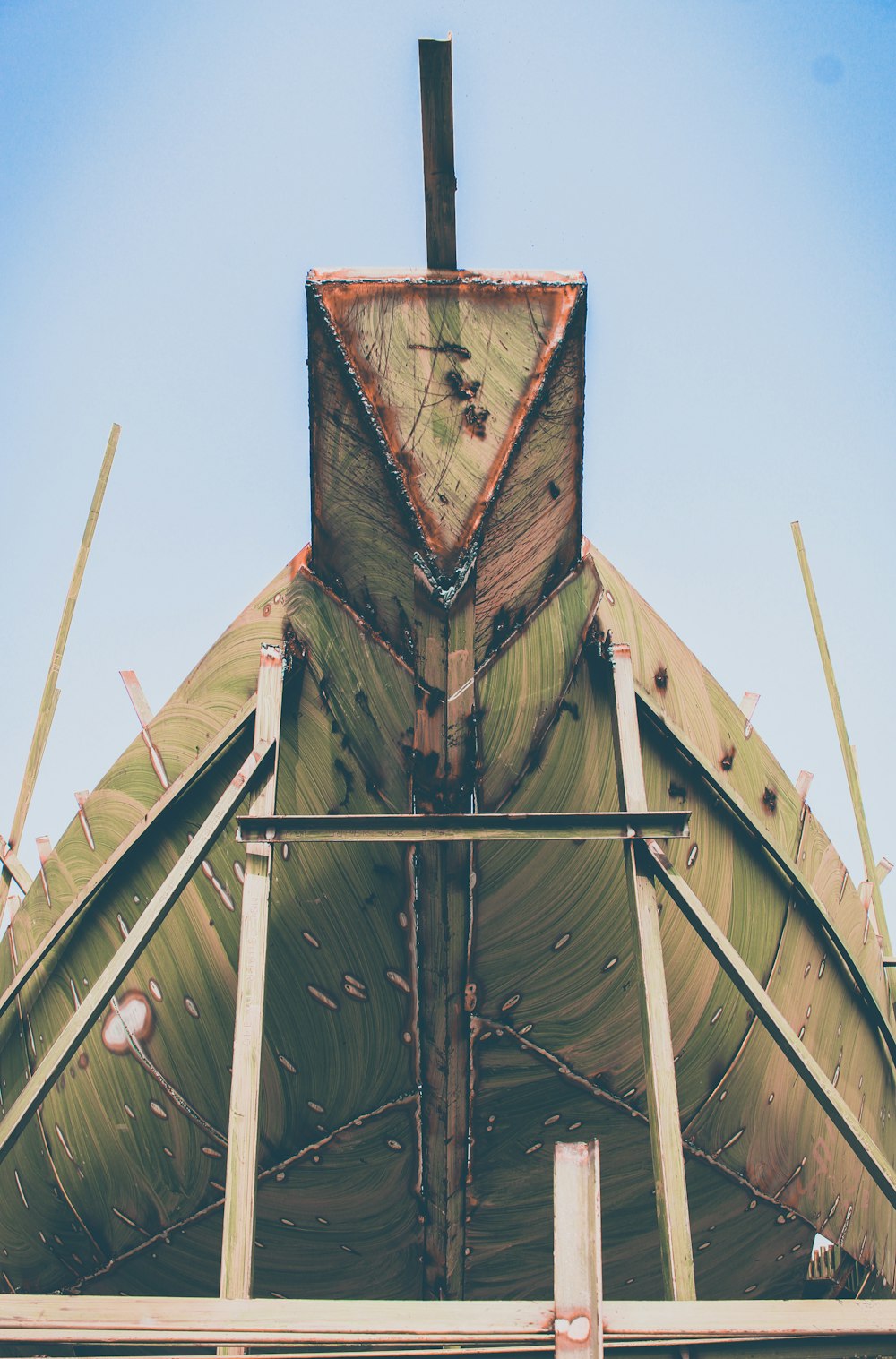 green and brown wooden windmill