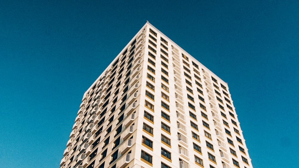 white concrete building under blue sky during daytime