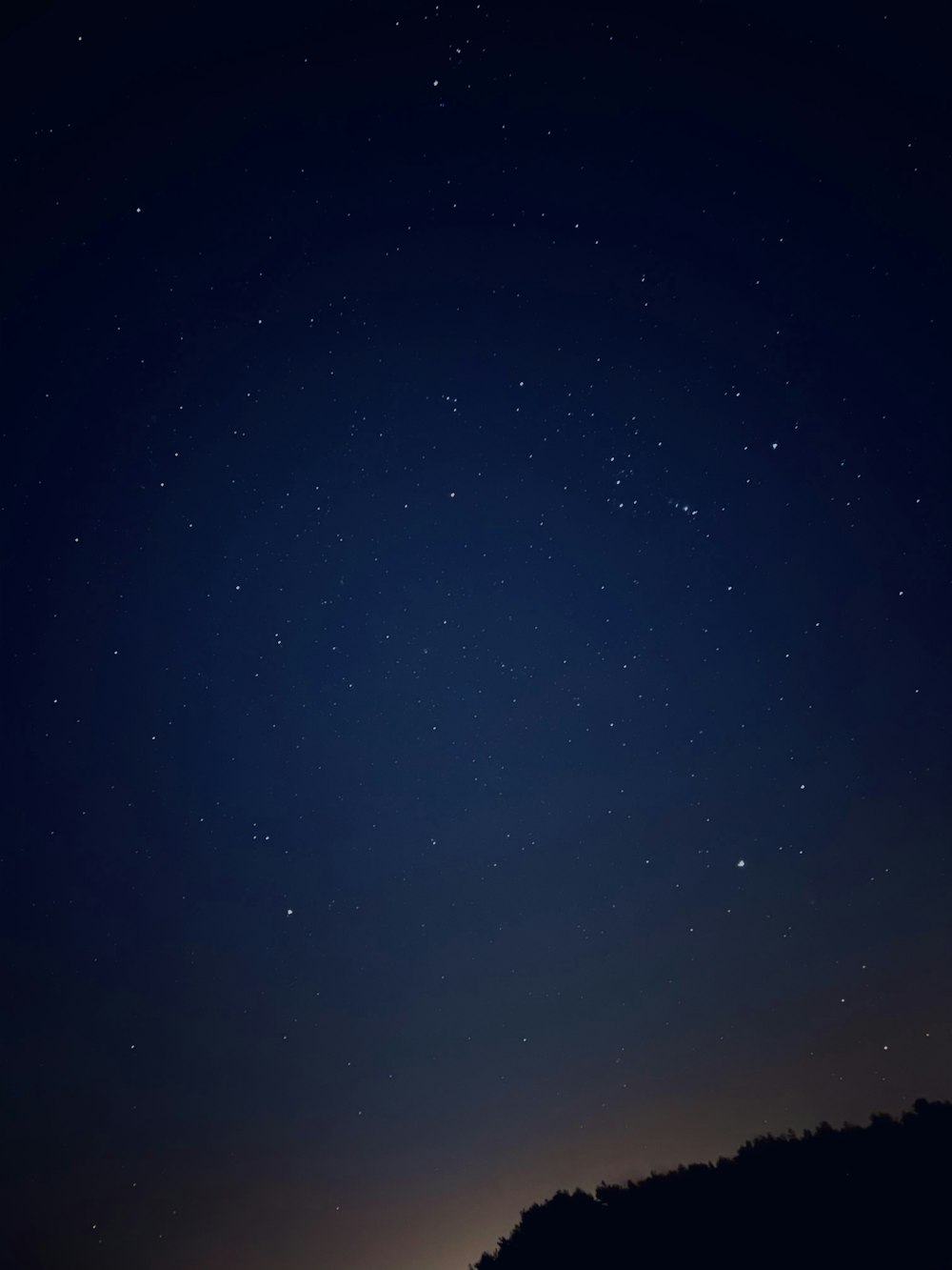 blue sky with stars during night time